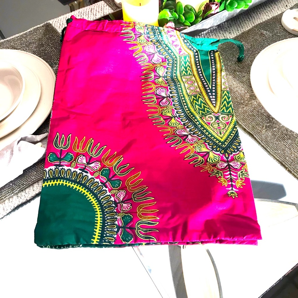 Pink and green drawstring bag.